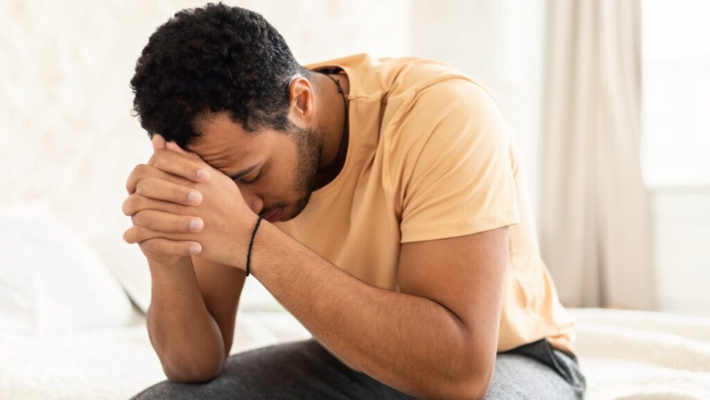 Male,Depression.,Unhappy,Middle,Eastern,Guy,Covering,Face,Having,Stress